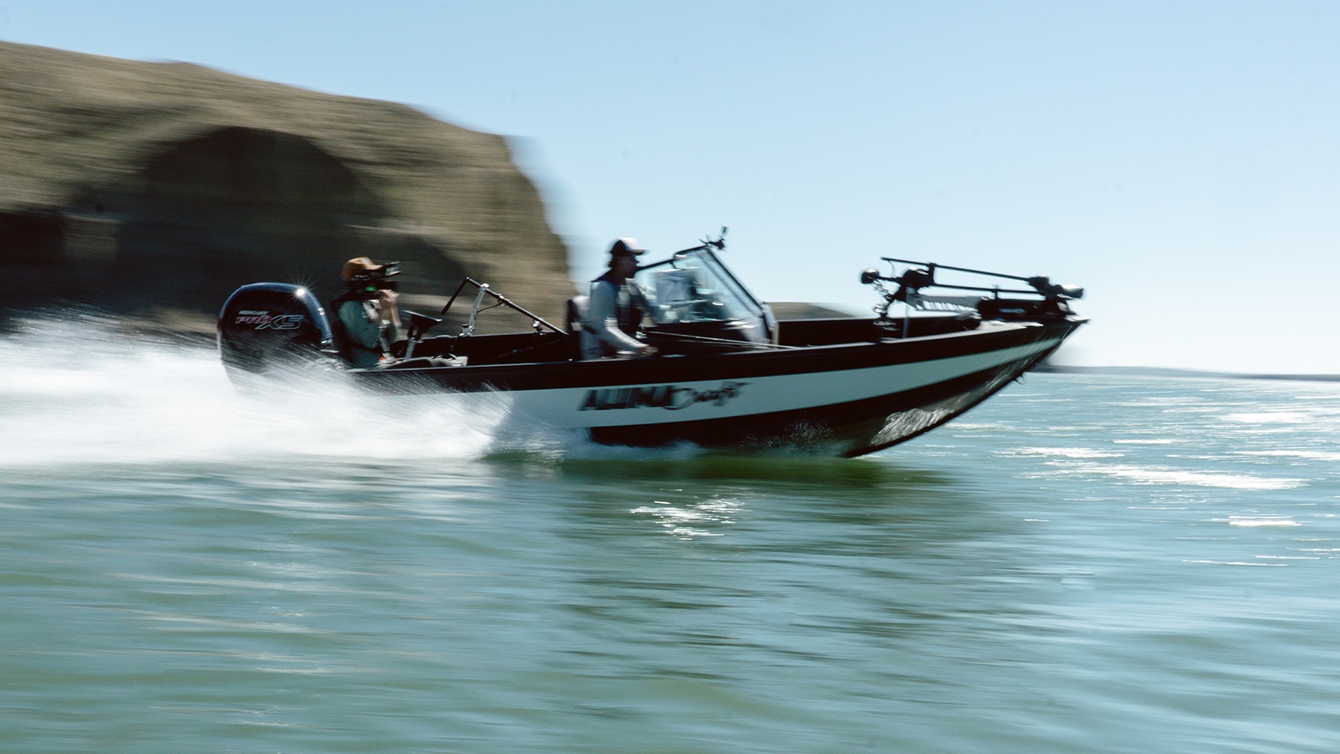 Seth and Chester boating in Alumacraft Competitor FSX