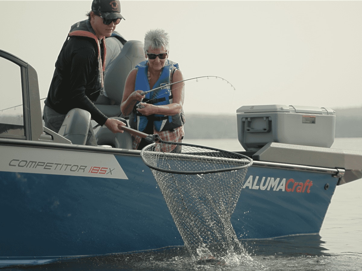 Jay Siemens and a woman fishing aboard an Alumacraft Competitor 185X