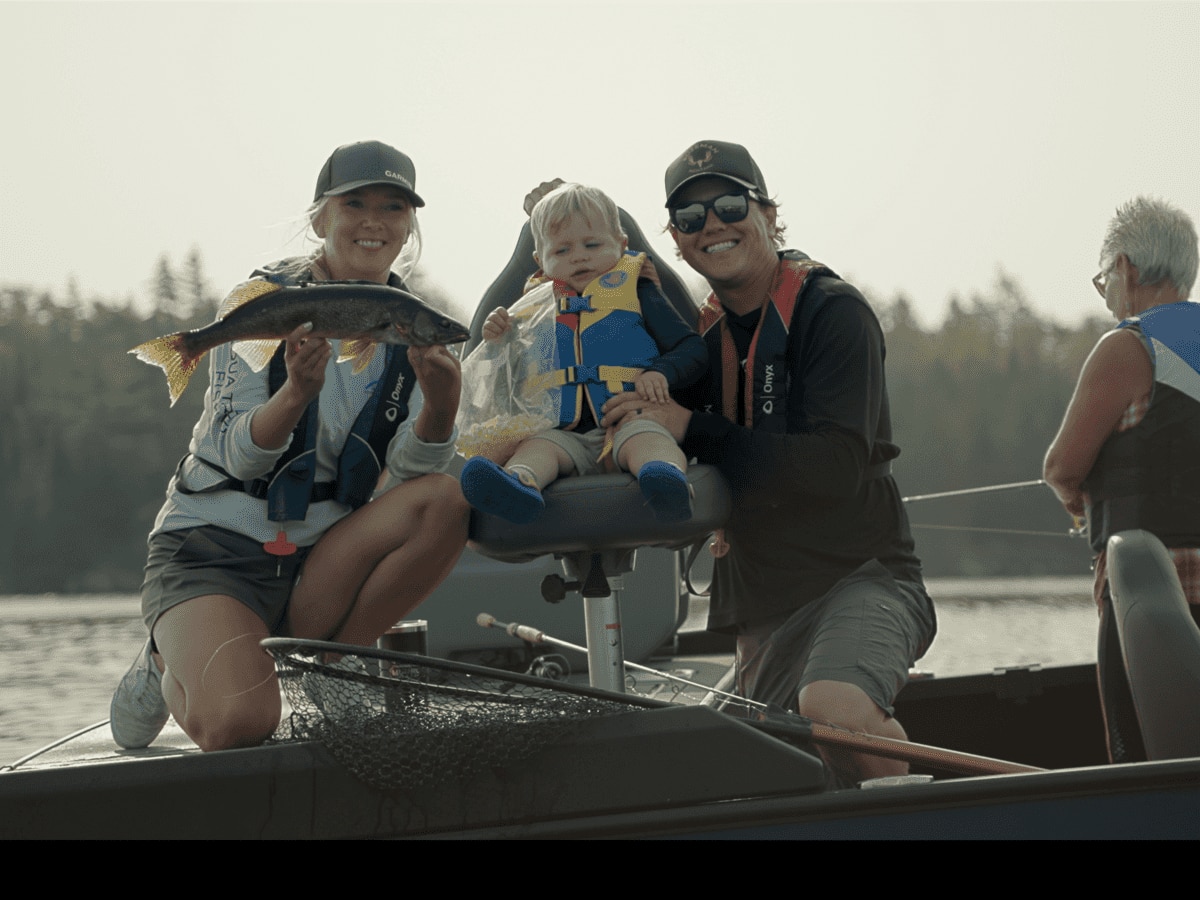 Jay Siemens and his family, happy to have caught a fish